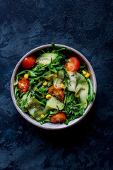 vegetable salad on a blue background on top