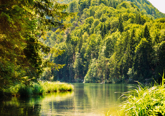 Fototapeta premium Mountain lake on the background of the Alps