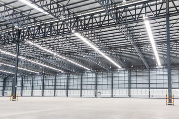 Empty warehouse. Factory building or warehouse building with concrete floor for industry.