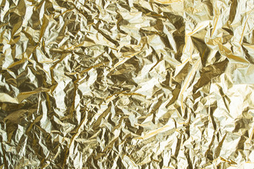 Gold paper texture. Abstract bright background for design