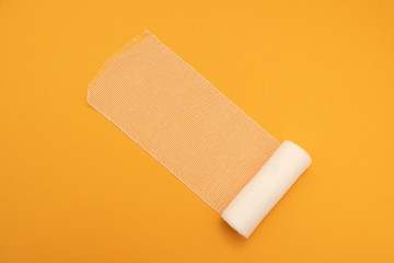 medical bandage isolated on yellow background