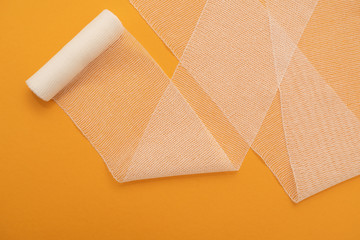 medical bandage isolated on yellow background