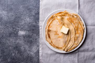 Pancakes crepes on dark background