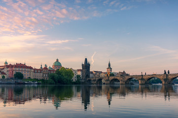 Old Prague cityscape with Charles Bridge at sunrise