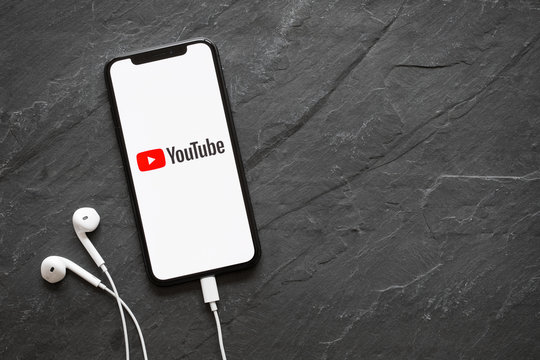 Riga, Latvia - March 25, 2018: iPhone X with YouTube logo on the screen.