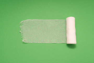 medical bandage isolated on green background