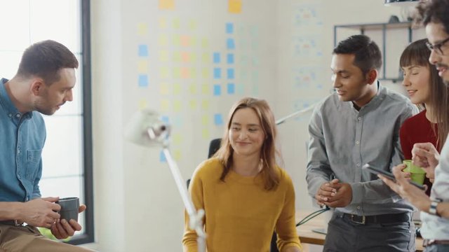 In the Modern Office: Diverse Group of Business Colleagues Have Meeting, Discuss Project Progress, Customer Experience Management, Startup Growth and Optimizing Strategy. Slow Motion