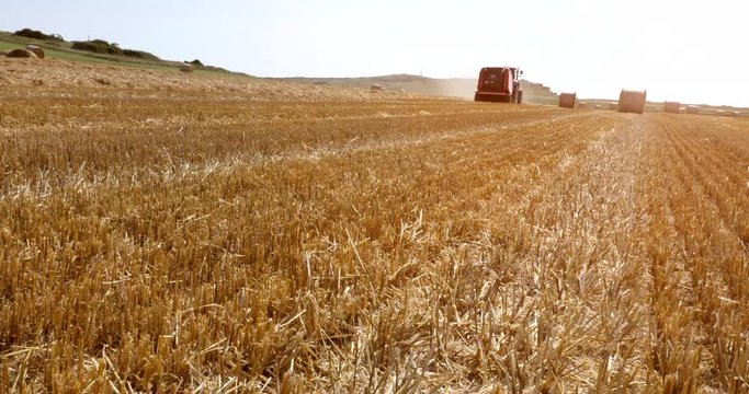 tractor and its trailer to make, the straw bales