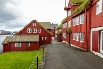 Old town of capital city of Torshavn. Typical houses with peat roof ( grass roof ). Faroes Islands....