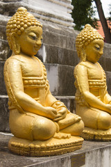 old thai golden buddha statue in wat kamae, chomthong chiangmai Thailand