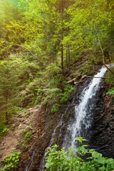 Fototapeta na wymiar Beautiful waterfall Guk in the forest.