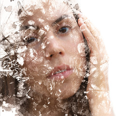 Paintography. Double Exposure portrait of a young beautiful woman with hand on face combined with hand drawn ink and pen drawing