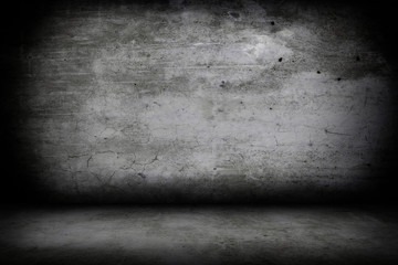 Grunge interior room with concrete wall and floor. Empty concrete space.