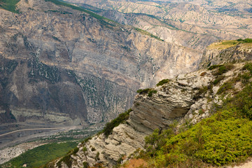 Fototapeta na wymiar Mountain landscape brown rocks, scenic view from the top