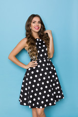 Beautiful Smiling Woman In Elegant Black Coctail Dress In Polka Dots Pattern