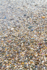 Sea stones on the seashore in the summer