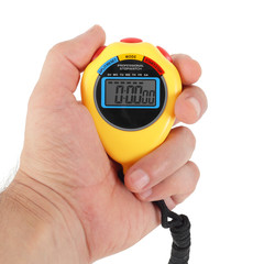 Sports equipment - Yellow Stopwatch in hand