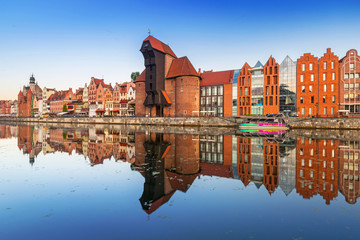 Fototapeta na wymiar Gdansk with beautiful old town over Motlawa river at sunrise, Poland.