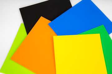 a textured paper on Top view of color background.