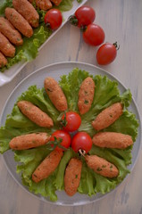 fresh salad with tomatoes and lentil patties