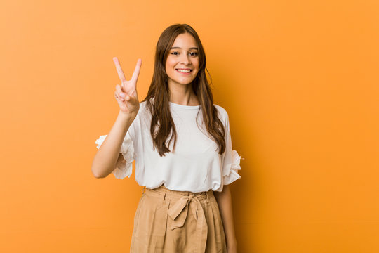 Young Caucasian Woman Showing Number Two With Fingers.