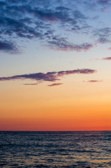 Amazing sea sunset, the sun, waves, clouds