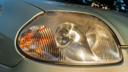 old car headlight close up