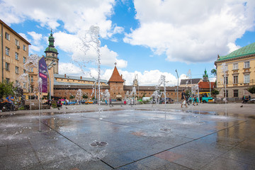View on Hlyniany Gate and Bernardine church from Fountain on Mytna (Сustoms) square
