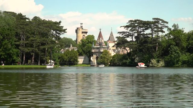 Laxenburg Castle victorious crossing the motor in a boat to visit this famous attraction near Vienna, Austria