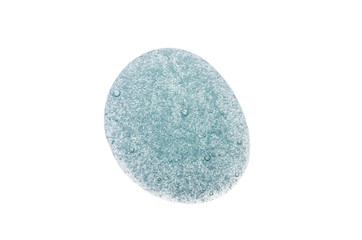 A drop of transparent blue gel for washing your face with bubbles. Isolated on a white background. Cosmetic texture, face and body care.