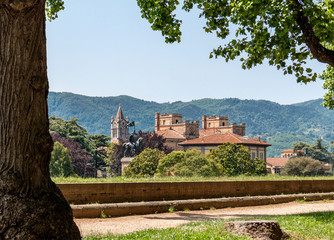 Scenic view from Lucca city walls towards the Equestrian Monument at Piazza Risorgimento. - obrazy, fototapety, plakaty