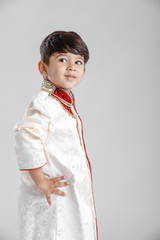 indian boy showing expression in ethnic wear 