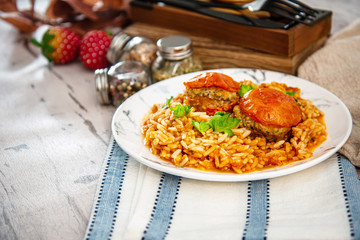 Stuffed tomatoes and rice with tomato