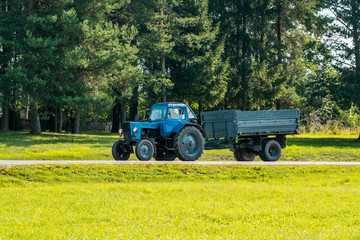 Fototapeta premium Tractor with a trailer