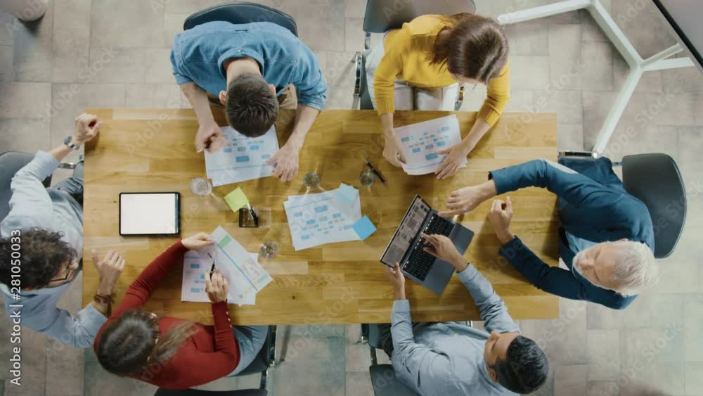 Poster startup meeting room: team of entrepreneurs sitting at the conference table have discussions, solve 