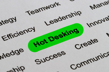 Fototapeta premium Hot Desking - Technology Business Buzzwords, printed on white paper and highlighted
