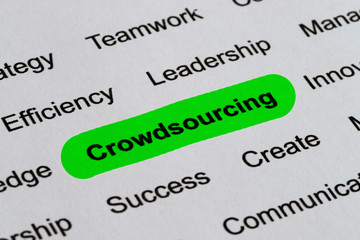 Crowdsourcing - Technology Business Buzzwords, printed on white paper and highlighted