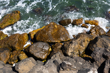 Waves splash on the rocks