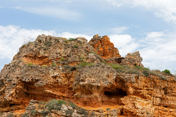 Rocky clay cliffs at the beach
