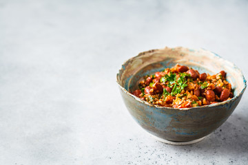 Georgian traditional beans lobio in bowl on a white-gray background.