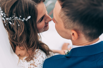 Wedding couple on the yacht, lovers posing on the yacht