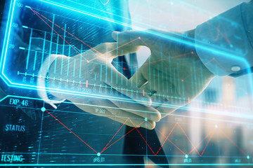 Double exposure of business theme drawing on cityscape background with handshake. Concept of...