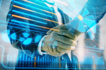 Double exposure of business theme drawing on cityscape background with handshake. Concept of...