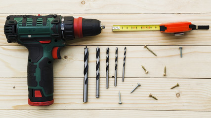 Carpenter workplace with drill and ruler