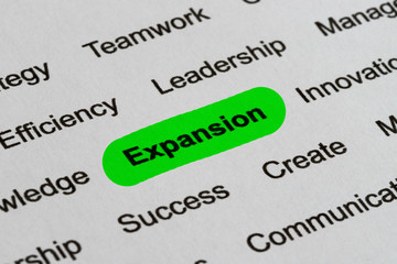Expansion - Business Buzzwords, printed on white paper and highlighted
