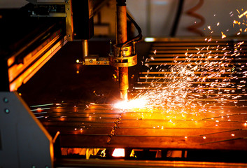Industrial cnc plasma cutting metal plate.