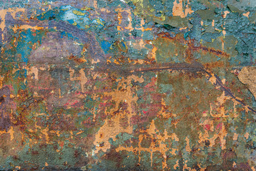Rusty old metal texture with flaked paint