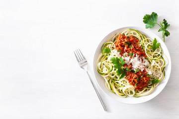 keto paleo zoodles bolognese: zucchini noodles with meat sauce and parmesan
