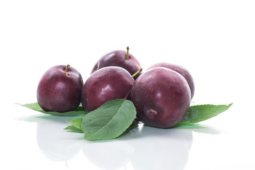 organic red ripe cherry plum isolated on white