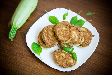 vegetable fritters made from green zucchini in a plate